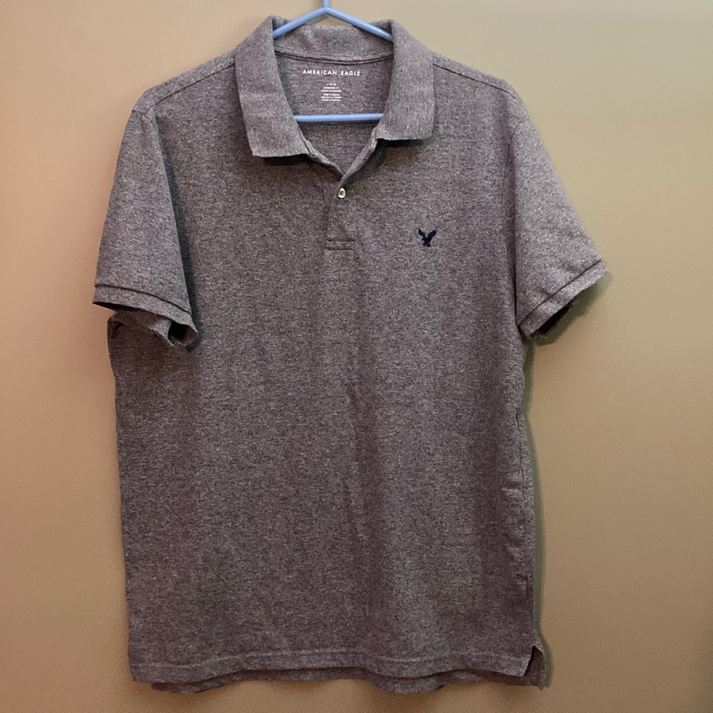 American Eagle grey polo tee with eagle logo on chest.